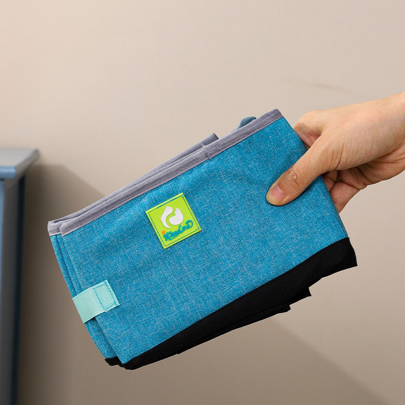 Bac à litière pliable pour chat bleu en tissu Oxford, poignée et étiquette OdorControl.