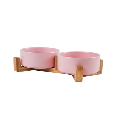 Gamelle surélevée double en céramique rose sur support bambou, deux bols pour chat