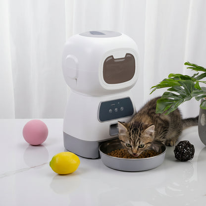 Distributeur de croquettes pour chat connecté blanc, bol inox et façade avec trappe noire