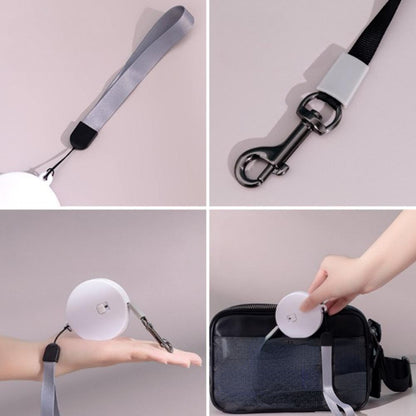 Enrouleur automatique pour laisse de chat blanc, sangle grise et clip métallique