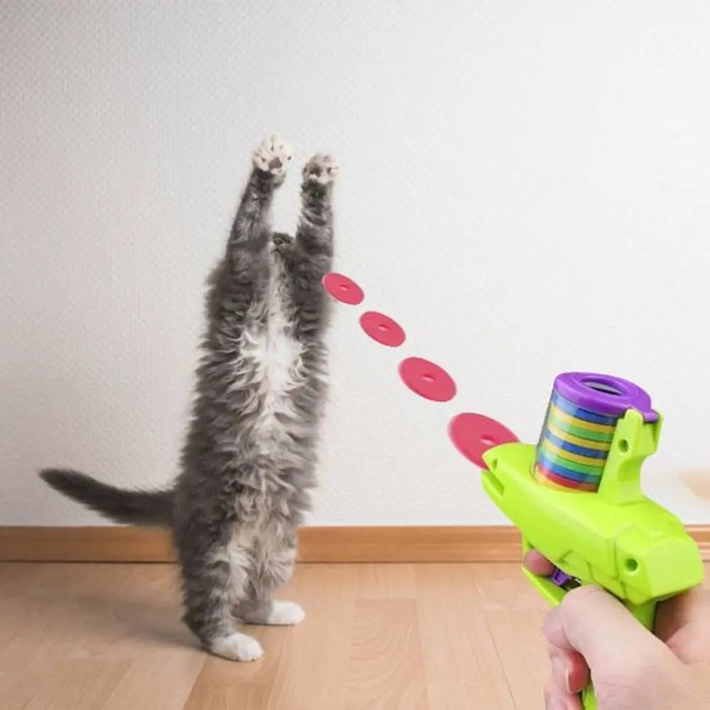Pistolet lance-disques pour chat vert lime avec tambour arc-en-ciel et disques roses