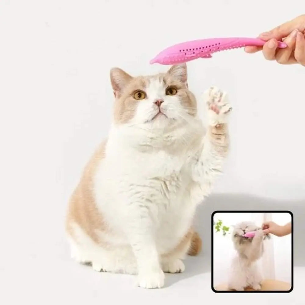 Jouet pour chat Instinct+ : poisson rose au-dessus de la patte du chat