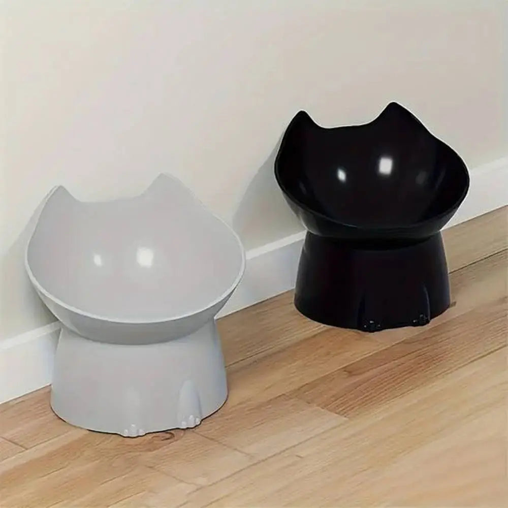 Gamelles surélevées pour chat Ergo blanche et noire, bols ronds sur socles.