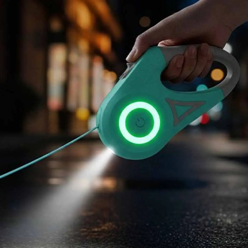Laisse rétractable pour chat vert avec lumière circulaire, corde sortant.