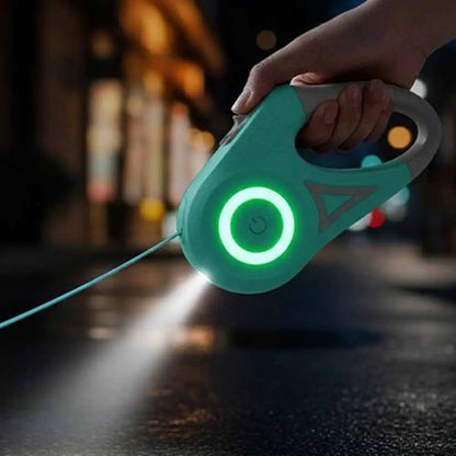 Laisse rétractable pour chat vert avec lumière circulaire, corde sortant.