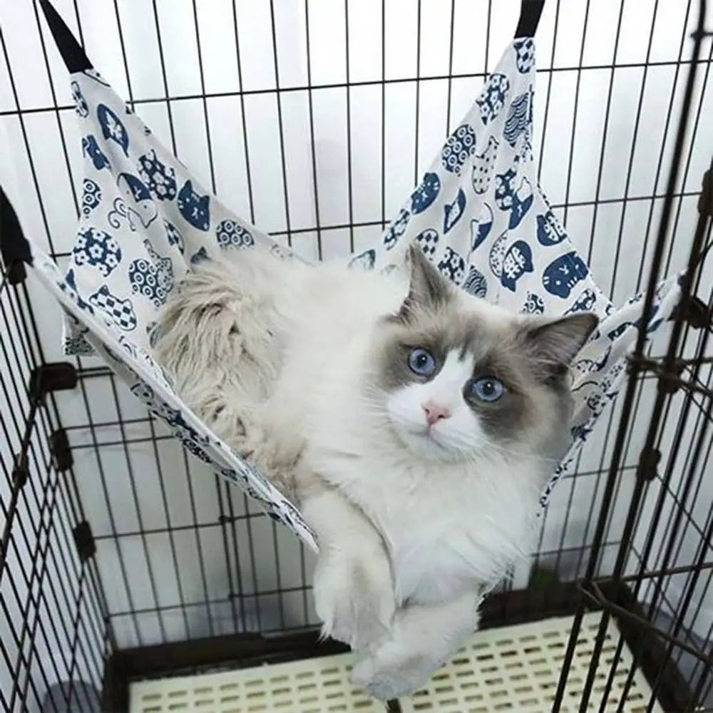 Hamac pour chat bleu et blanc à motifs, avec sangles noires