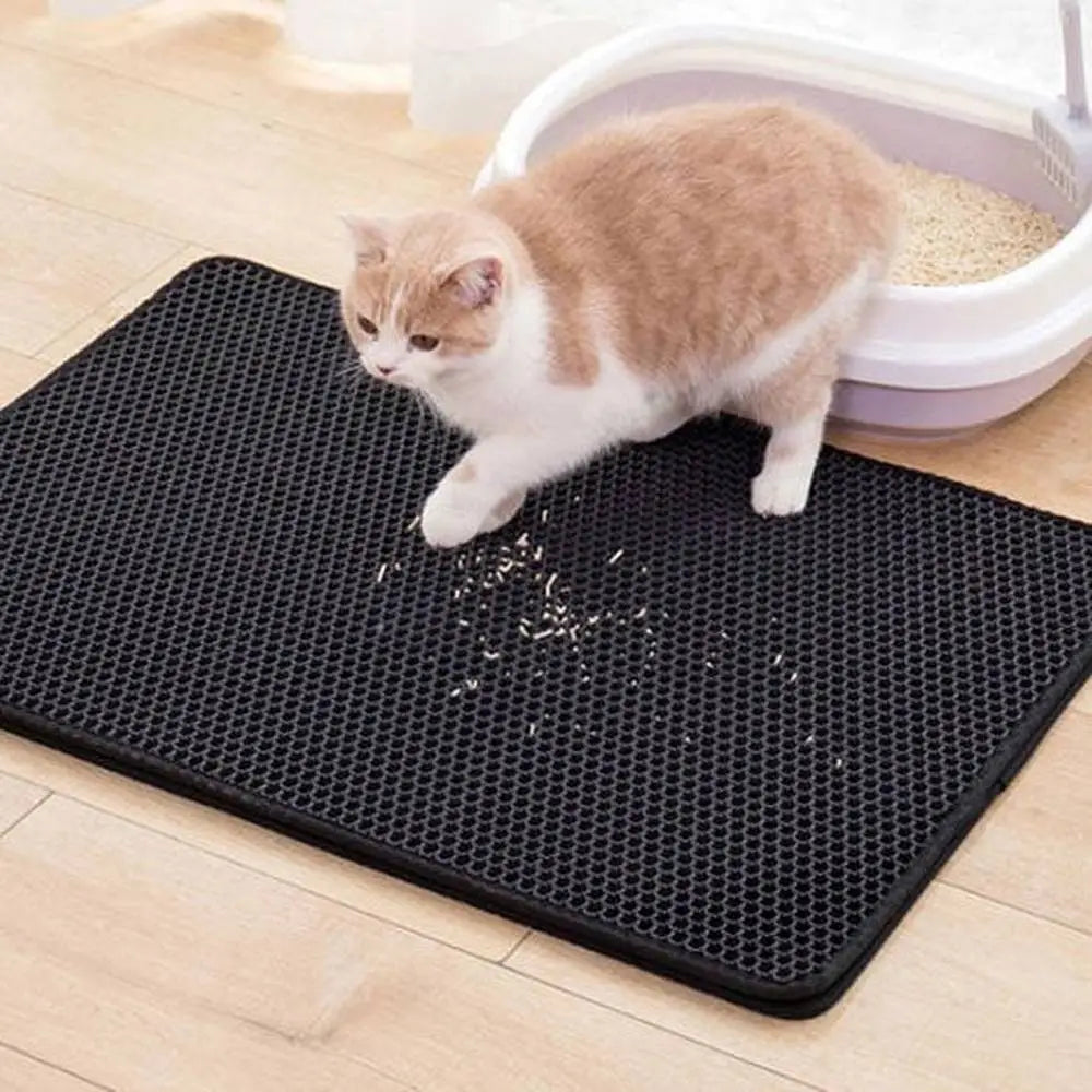 Tapis de litière pour chat double couche imperméable, alvéoles noires avec chat roux et blanc