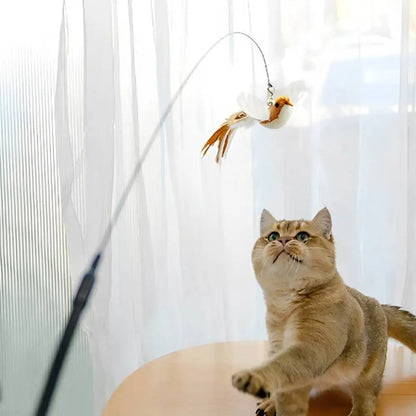 Baguette de jeu interactive pour chat avec oiseau blanc et plumes, suspendu par une corde