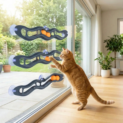 Jouet interactif pour chat à ventouses, barre noire ondulée avec éléments orange et bleus, chat roux