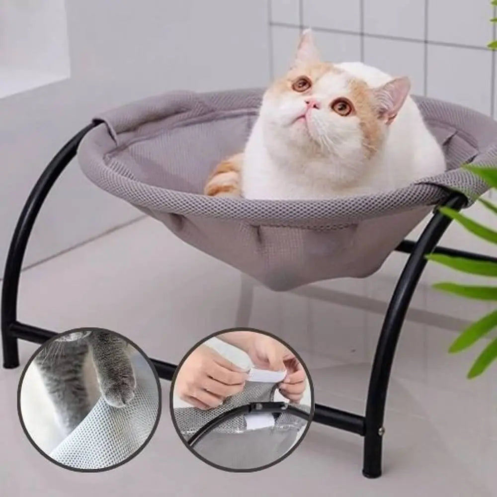Hamac pour chat gris à rebords arrondis, cadre noir, chat blanc assis
