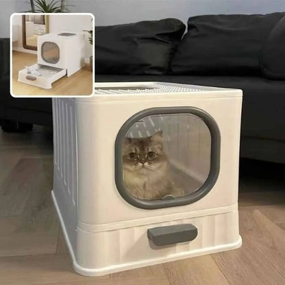 Bac à litière pour chat Ultra-Resist blanc, hublot ovale gris foncé et poignée avant, chat observant.
