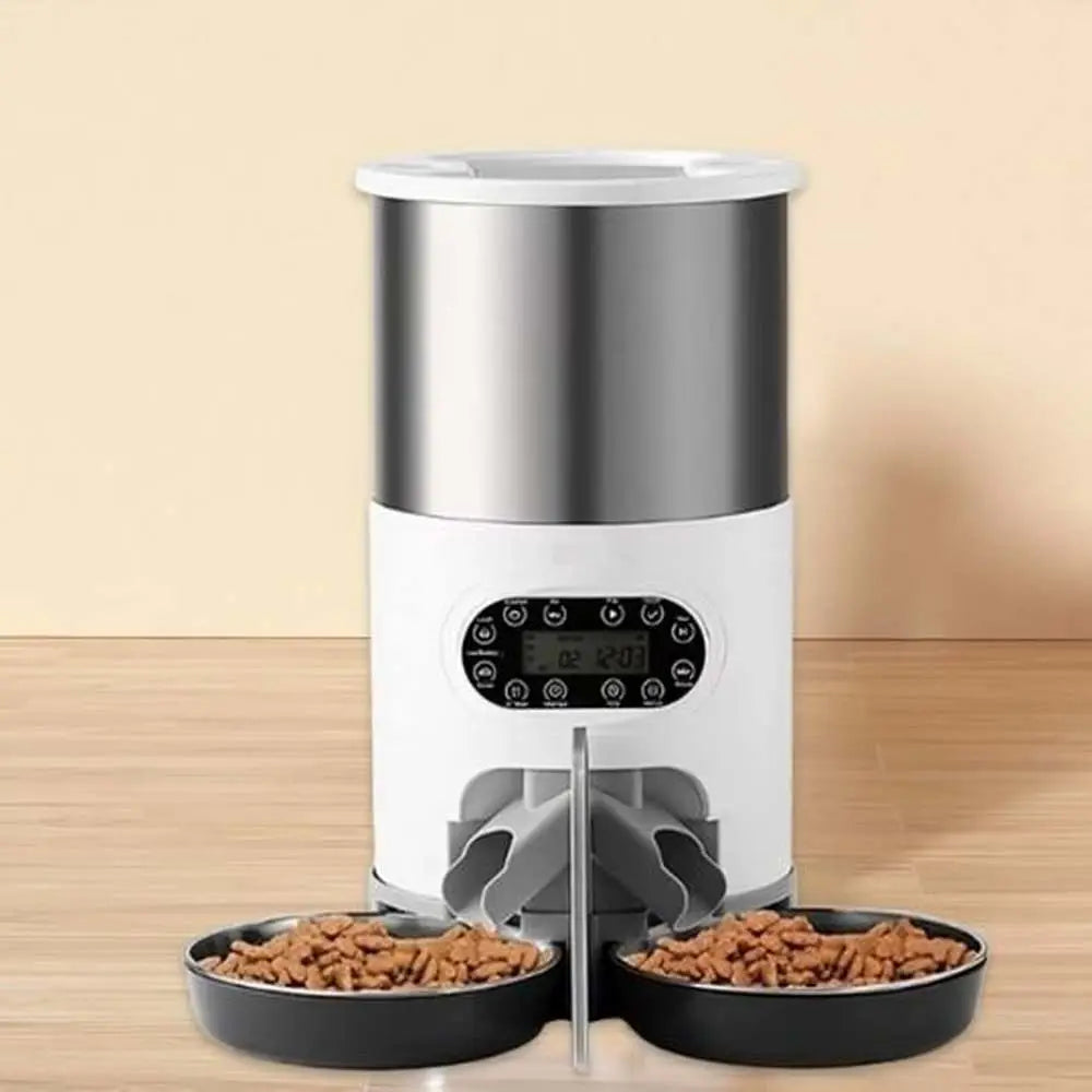 Distributeur croquettes SmartFeeder blanc, acier inox, deux bols noirs et mécanisme central.