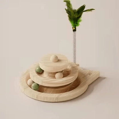 Jouet en bois en forme de chat, plateau spiral avec boules vert olive et plume verte