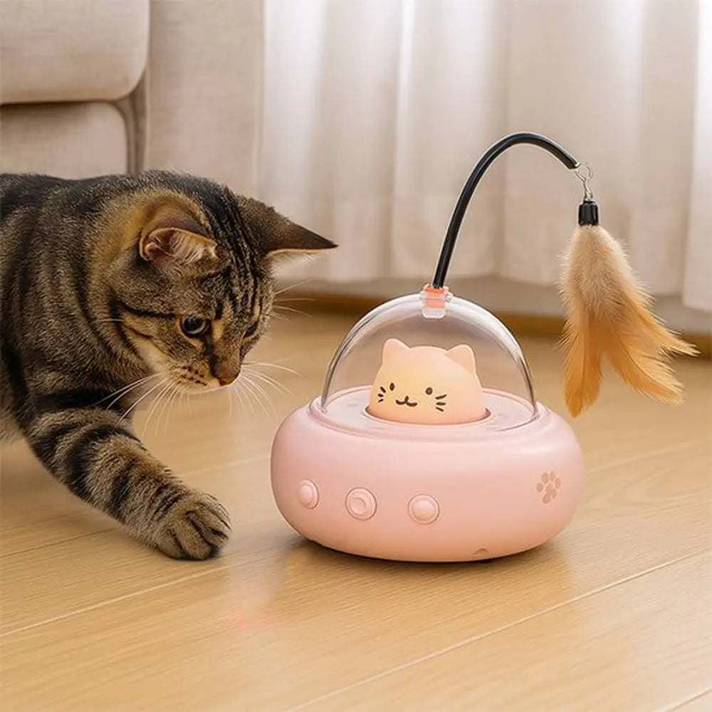 Boule automatique rose pour chat, tête de chat souriante sous dôme transparent