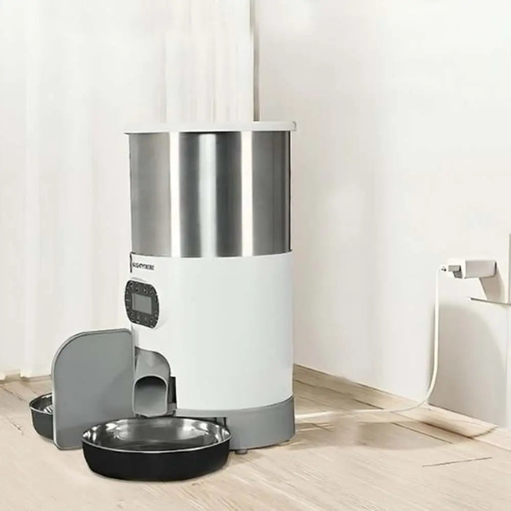 Distributeur croquettes SmartFeeder blanc, panneau de commande et bol métallique noir.