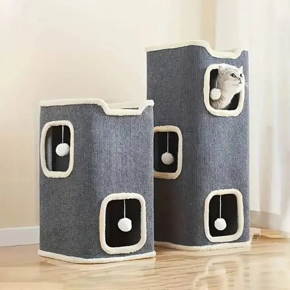 Arbre à chat compact gris foncé, vue de côté, avec 4 ouvertures bordées de blanc et balles.