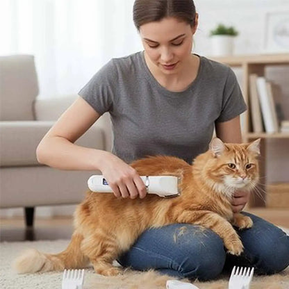 Tondeuse pour chat blanche sur le dos du chat, avec peigne amovible