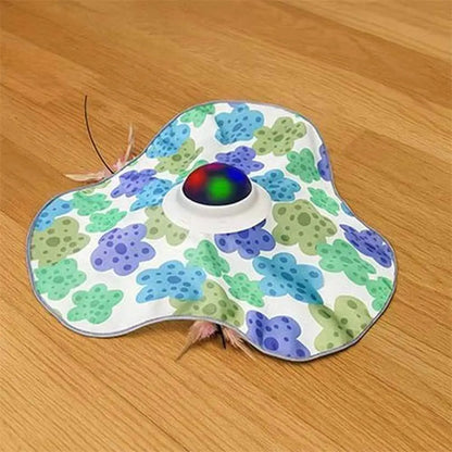 Jouet chat interactif FéliStim: tapis ovale coloré avec dôme lumineux multicolore au centre