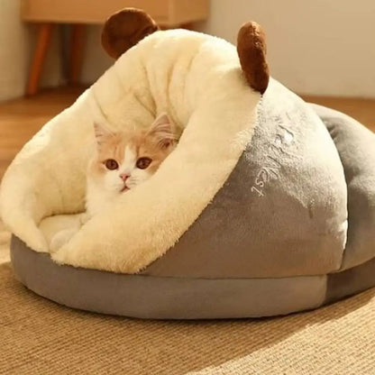 Panier pour chat cocon douillet beige et gris, ouverture arrondie rembourrée.