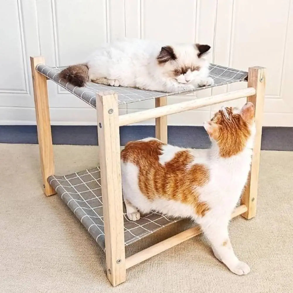 Hamac pour chat Cozy-Perch à rayures bleu et blanc, cadre en bois, chat blanc et tigré