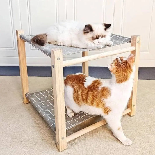 Hamac pour chat Cozy-Perch à rayures bleu et blanc, cadre en bois, chat blanc et tigré