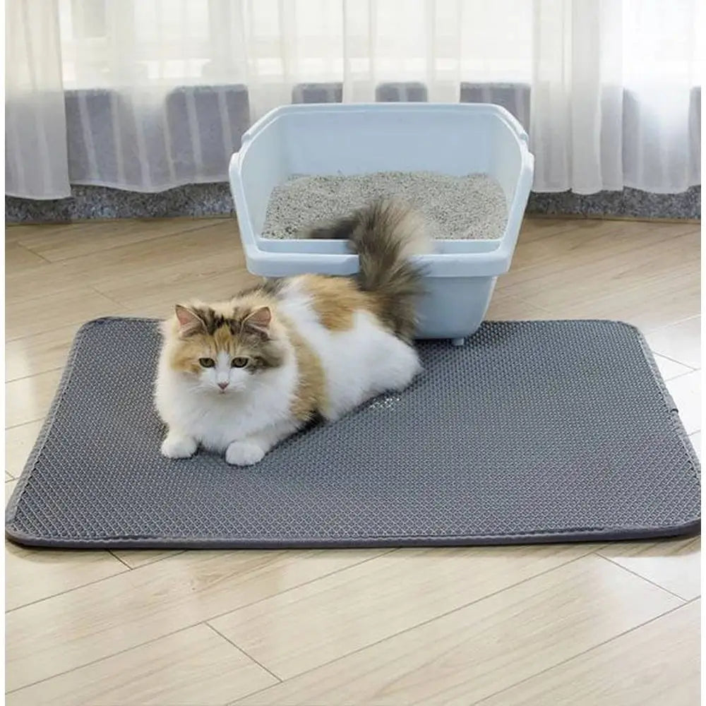 Tapis de litière pour chat double couche imperméable, alvéoles gris foncé avec chat blanc