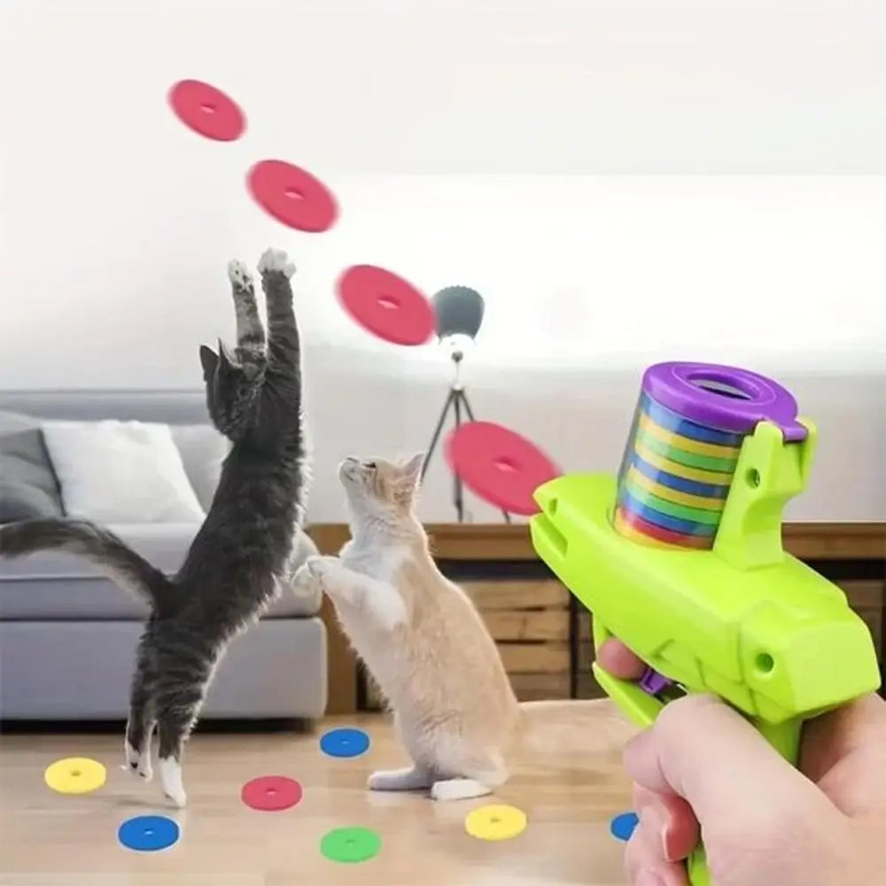 Pistolet lance-disques pour chat vert lime avec tambour rayé arc-en-ciel et disques roses