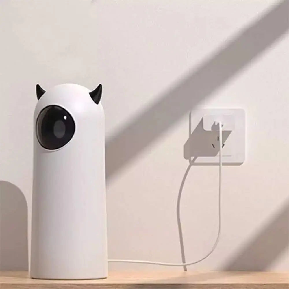 Jouet interactif pour chat PetPlay blanc, boîtier cylindrique et câble de connexion