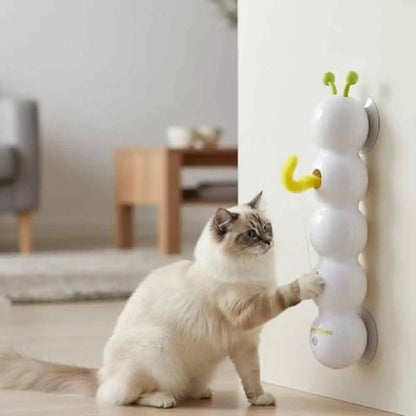 Jouet interactif pour chat blanc à antennes vertes, chat blanc joue en intérieur