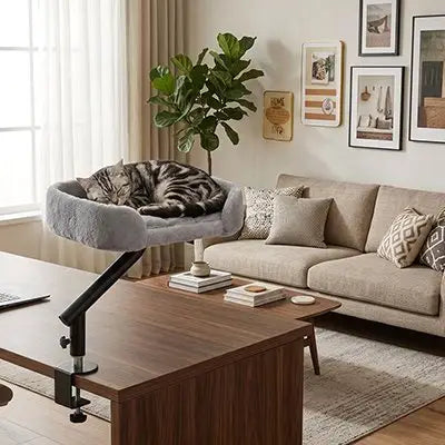 Lit pour chat gris avec coussin rond et support en métal noir, pour table