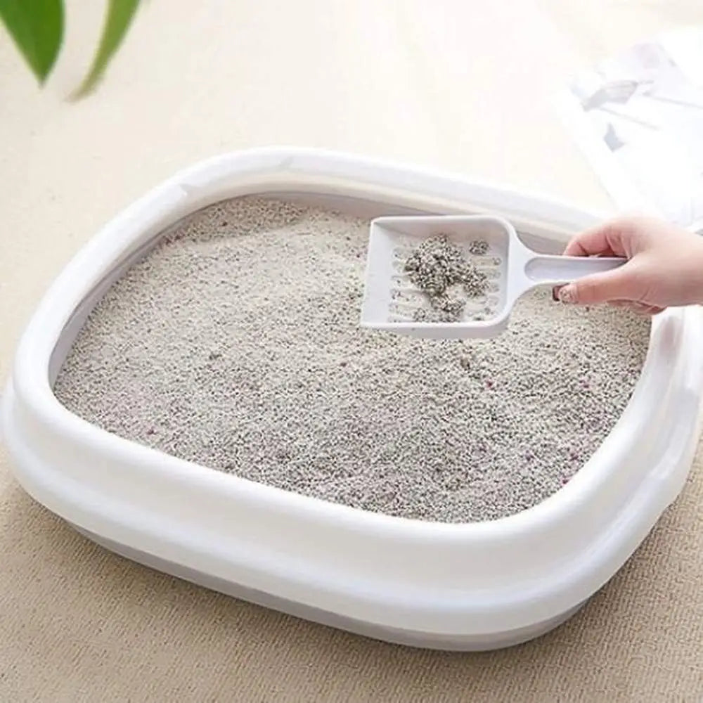 Bac à litière pour chat CleanComfort, pelle et litière grise dans le bac