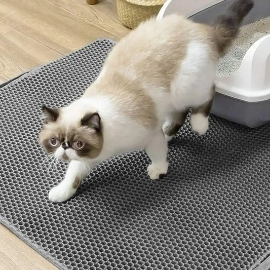 Tapis de litière pour chat double couche imperméable, alvéoles gris foncé avec chat crème