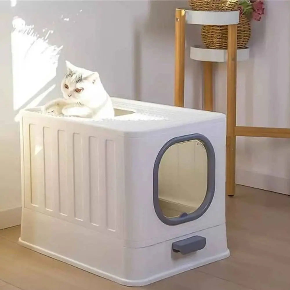 Bac à litière pour chat Ultra-Resist blanc, porte hublot ovale gris foncé, poignée avant.