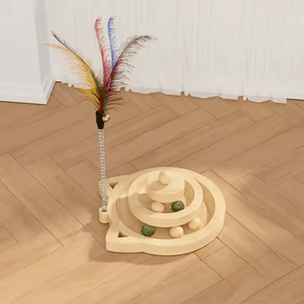 Jouet en bois SpinningCatToy™ en forme de chat: plateau spiral, boules vert olive, plume multicolore