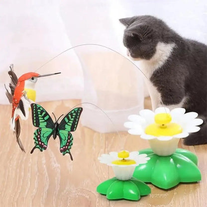 Jouet interactif pour chat avec base verte et marguerites blanches; papillons multicolores